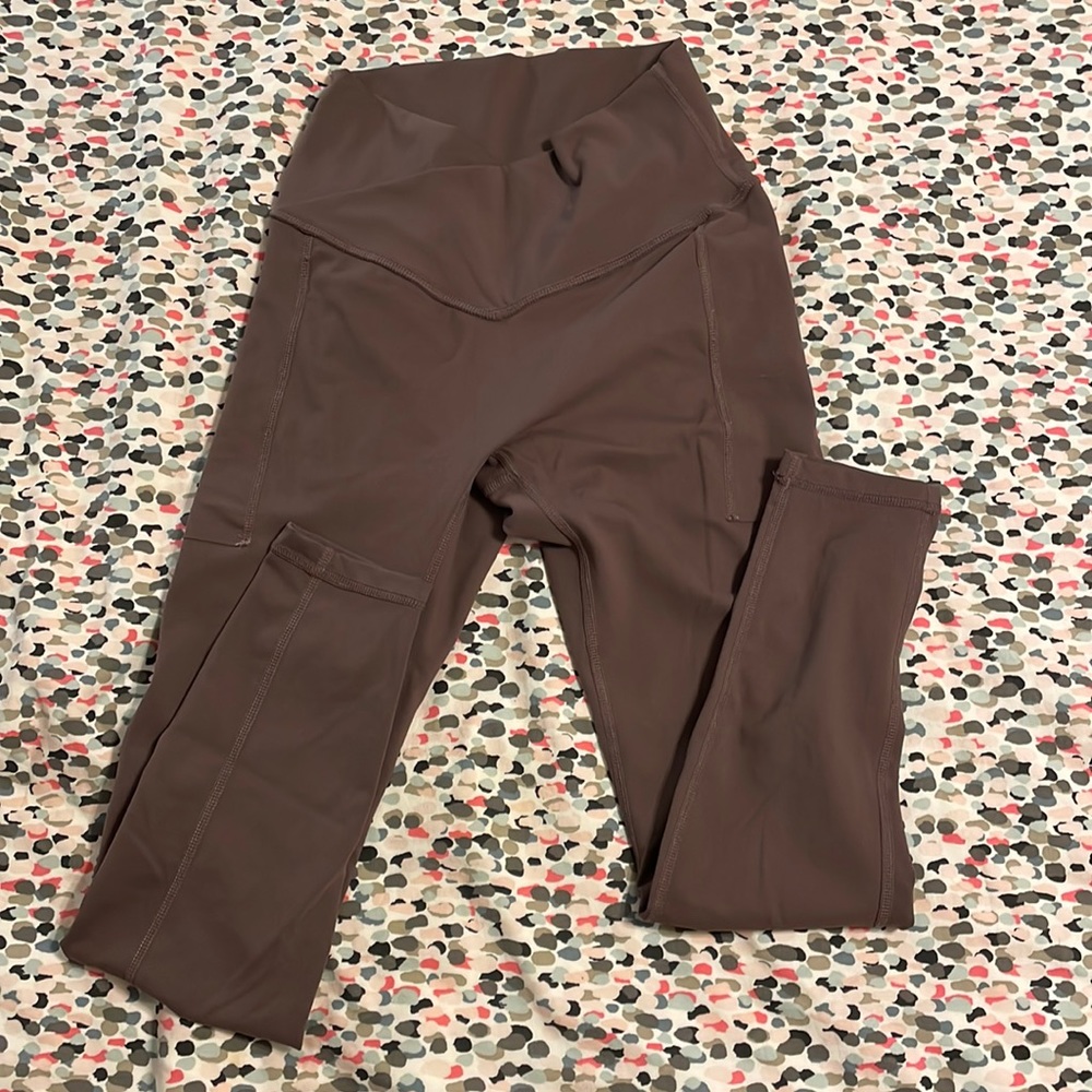 Brand new Popflex crossover leggings. Side pockets 25” inseam